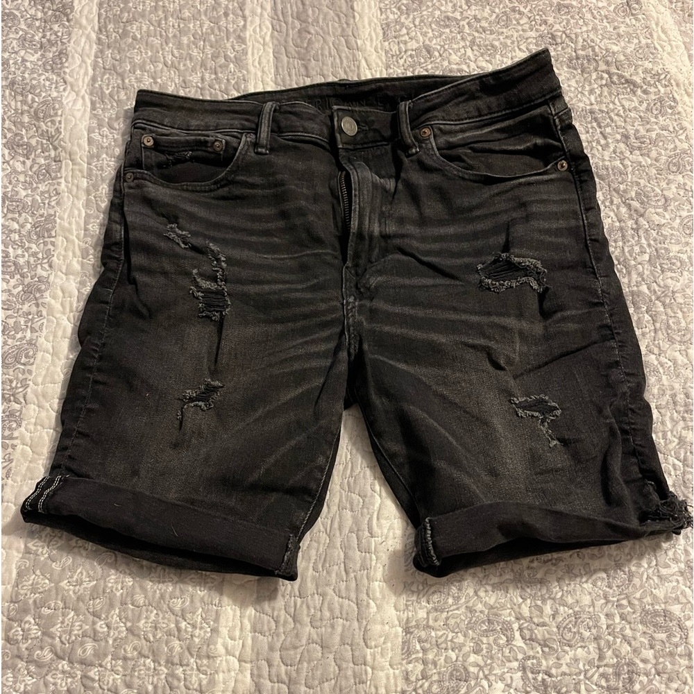 American Eagle Outfitters, young men’s black denim, distressed shorts, size 33W.